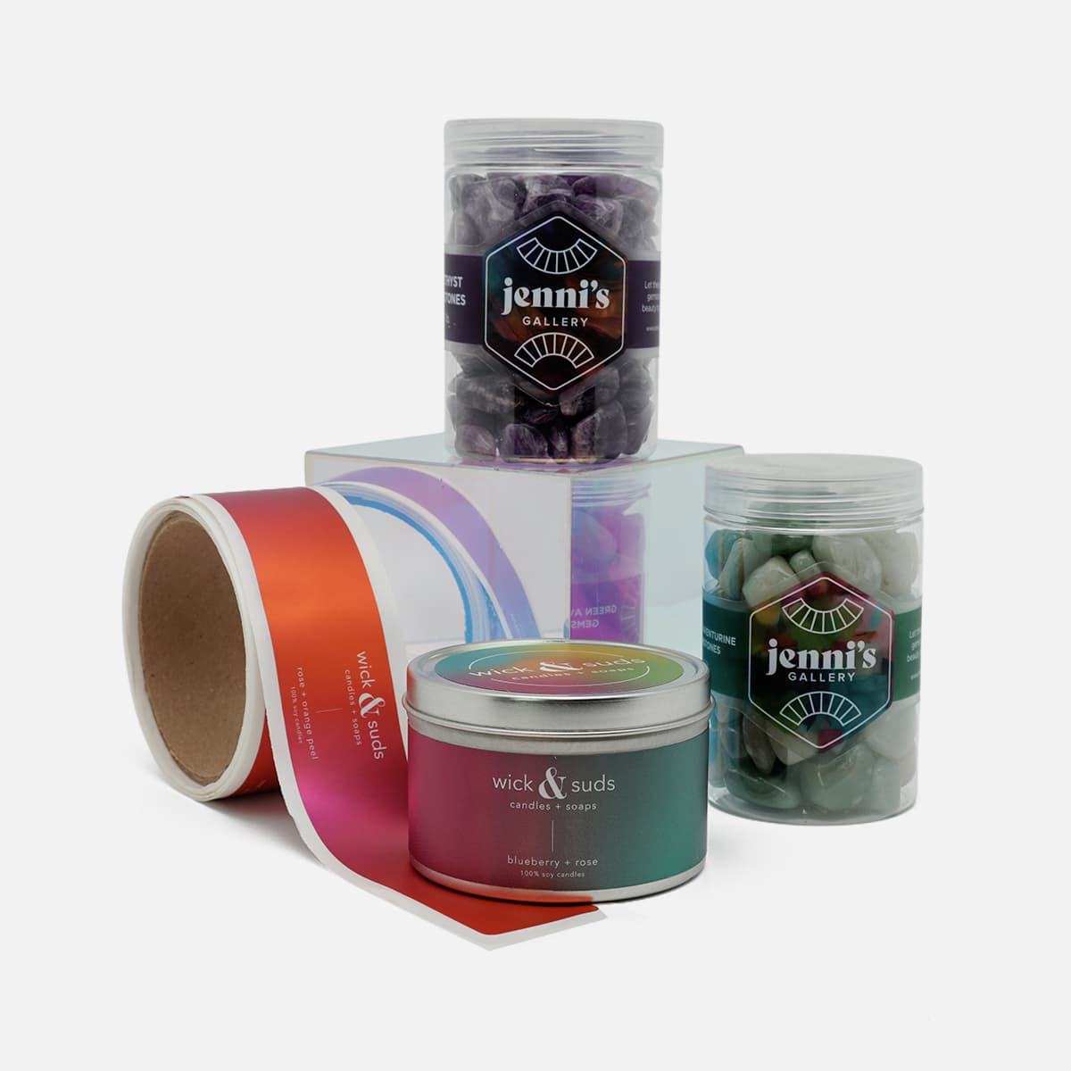 Laminated product labels applied to retail packaging, candles, and gemstone containers, providing durable branding for makers and small businesses.