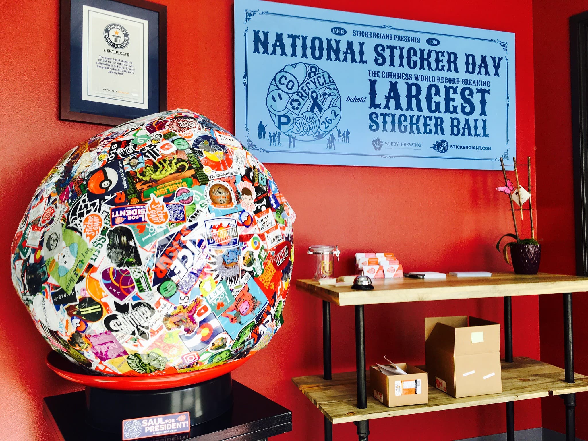 Sticker Giant's Guinness World Record largest sticker ball displayed in the company lobby during National Sticker Day.