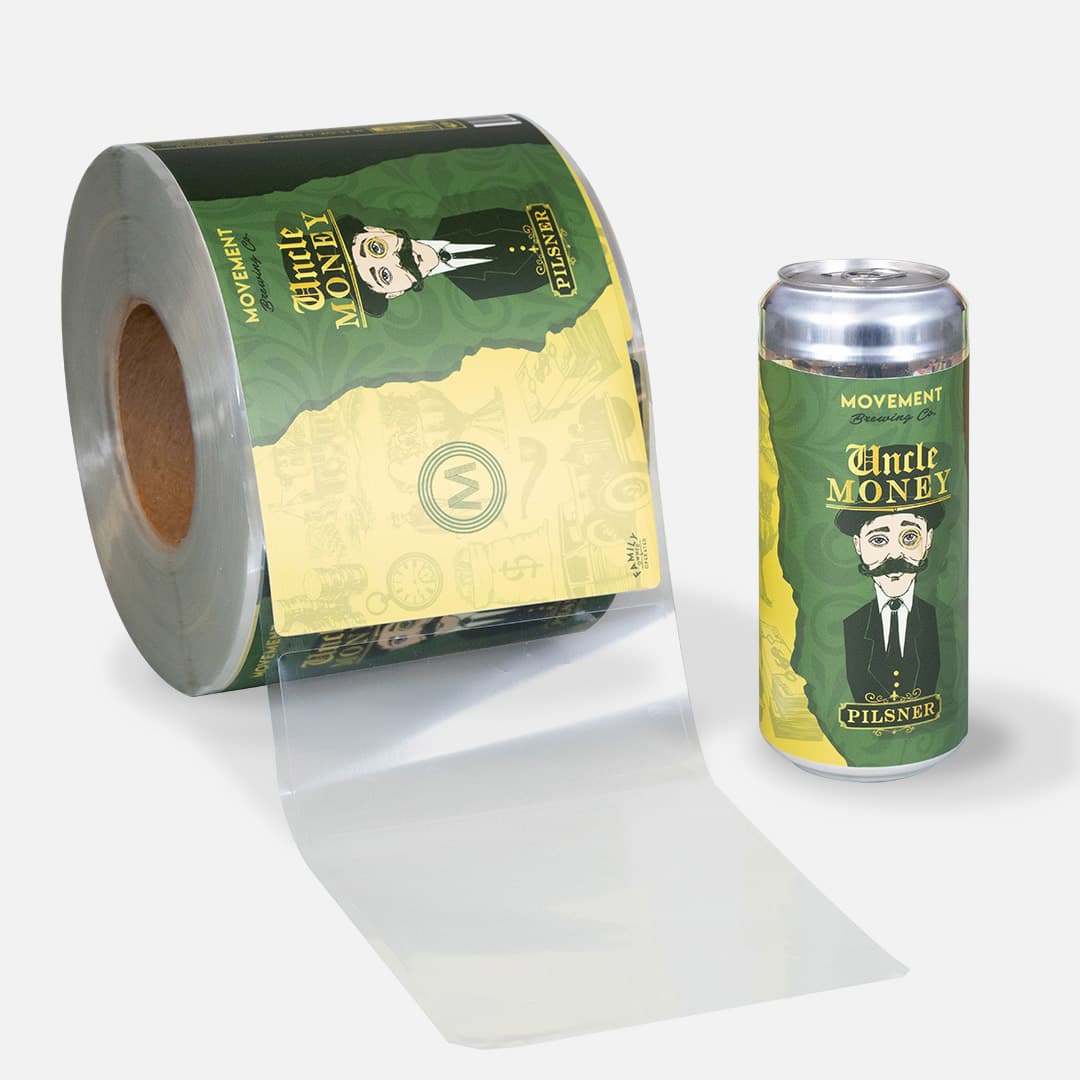 Custom PET label roll and labeled craft beer can, demonstrating transparent labels for beverage and brewery packaging.