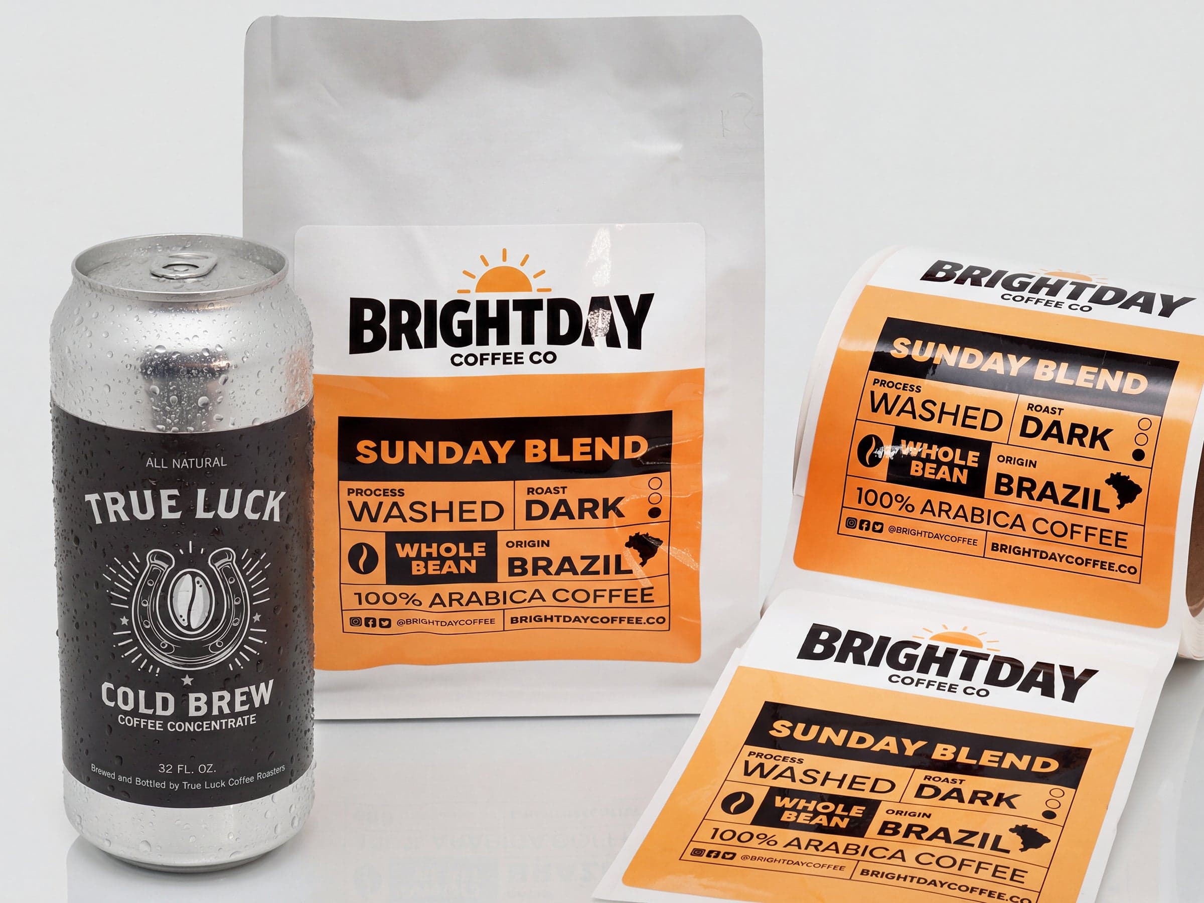 Custom laminated BOPP coffee labels applied to a cold brew can, coffee bag packaging, and roll labels for food and beverage products.